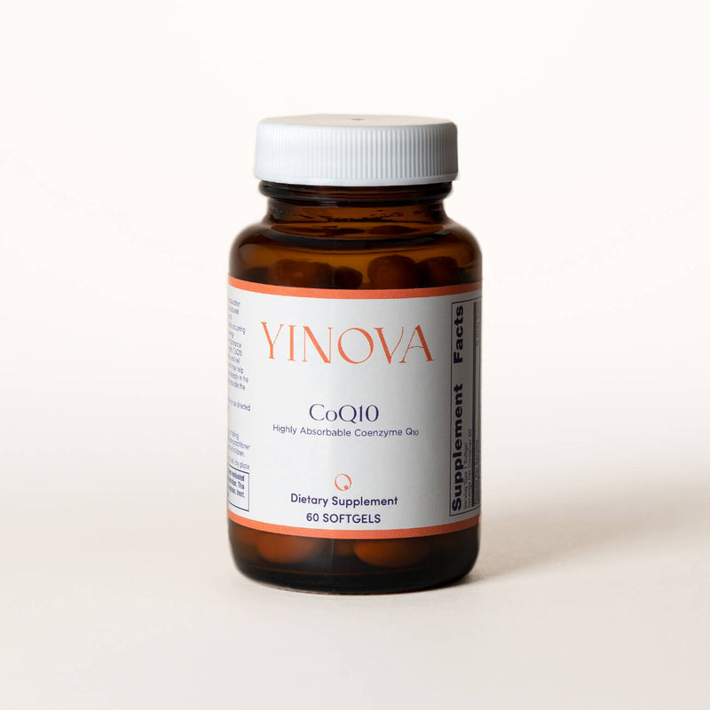Clear brown bottle containing Yinova’s blend of CoEnzyme Q10 tablets (CoQ10)