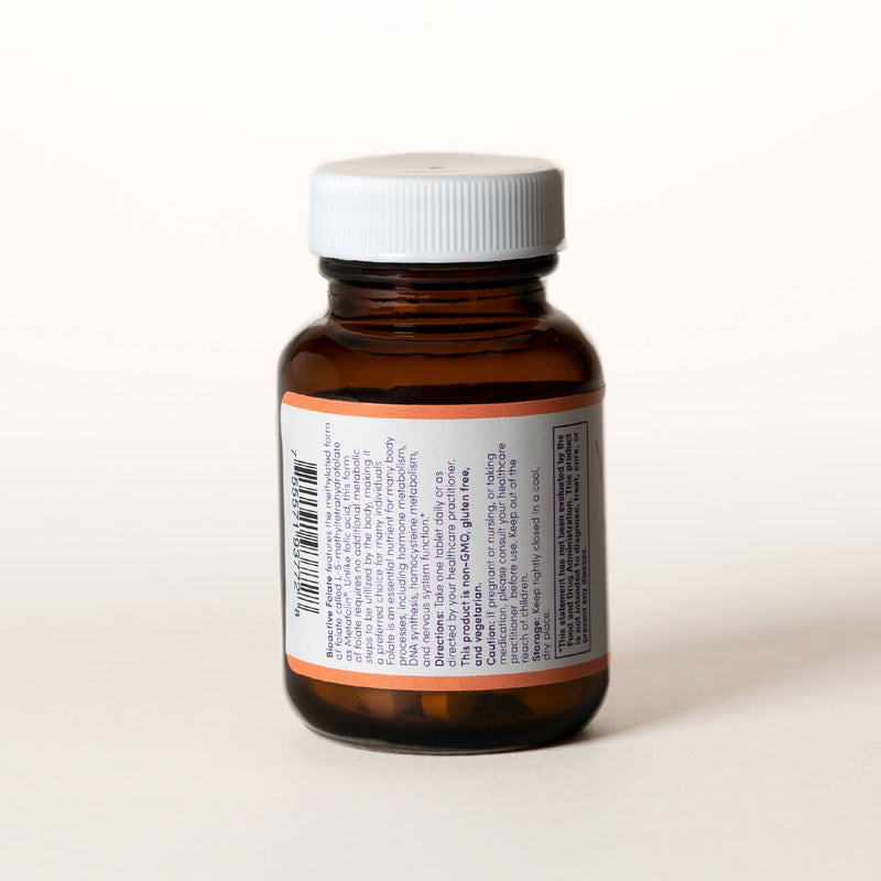 List of ingredients for Bioactive Folate tablets on the back of a clear brown bottle.