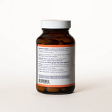 List of ingredients for Magnesium Citrate tablets on the back of a clear brown bottle.
